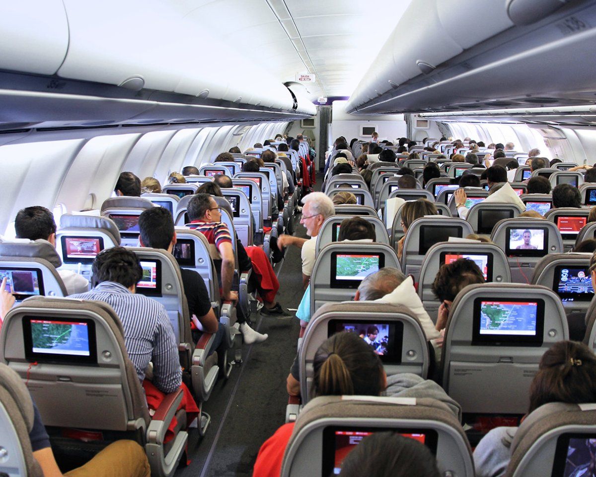 Passagerare i en flygkabin
